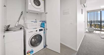 Sleek 2-Bed Apartment with Rooftop Garden Access