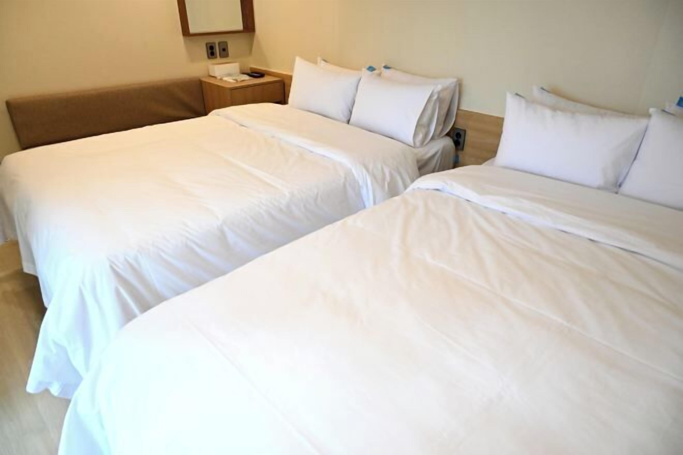 Memory foam beds, desk, iron/ironing board, free WiFi