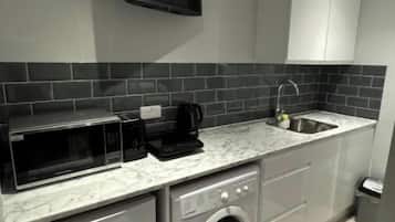 Microwave, stovetop, electric kettle, toaster