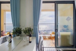 Deluxe Apartment, Balcony, Beach View | Terrace/patio