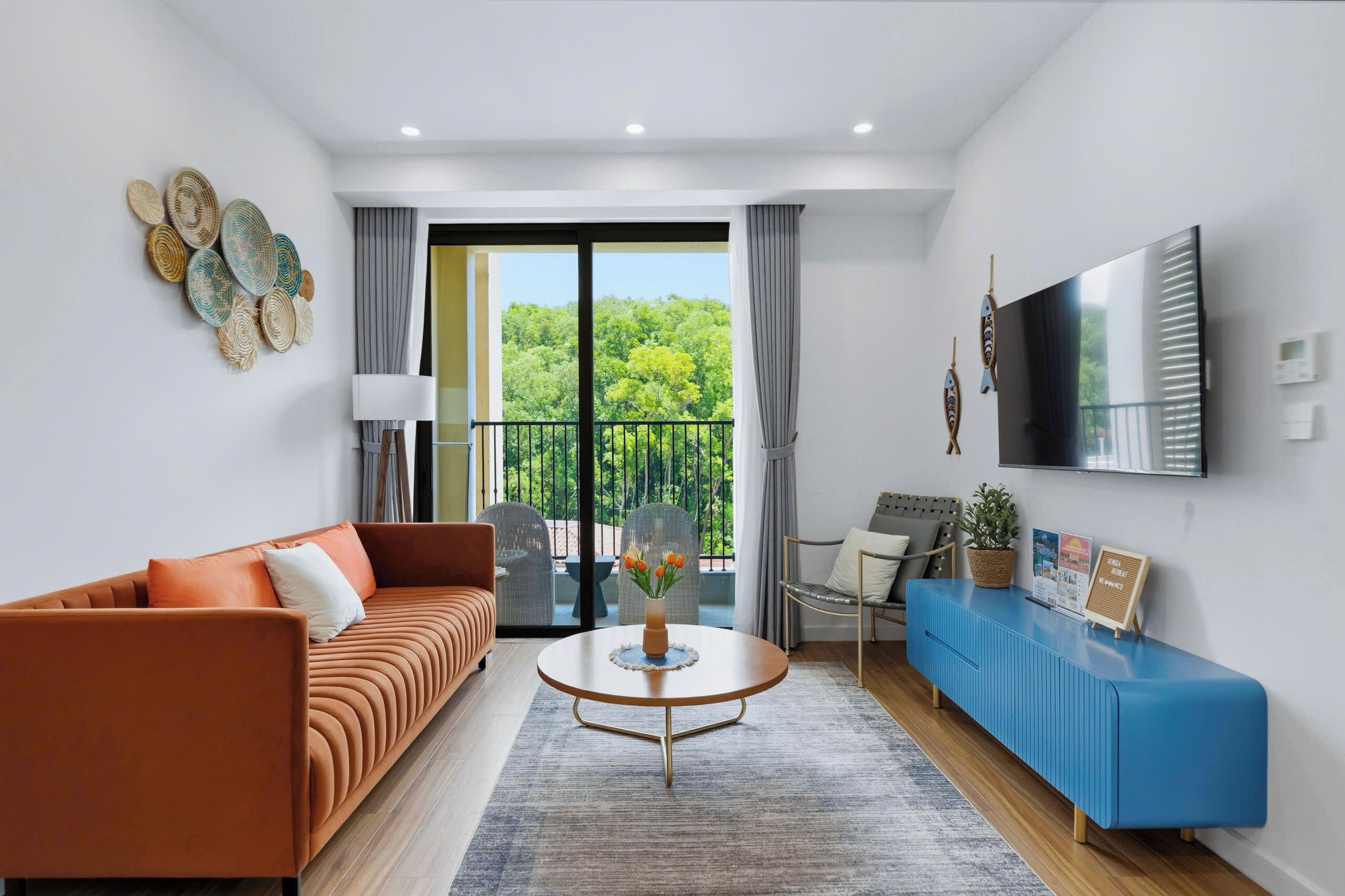 Comfort Apartment, Balcony, Mountain View | Living area | 50-inch flat-screen TV with satellite channels