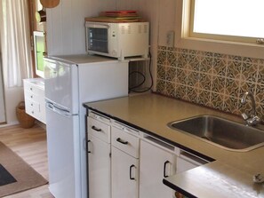 Fridge, oven, cookware/dishes/utensils