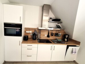 Geladeira, fogão, cooktop, lava-louças