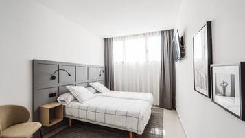 Desk, laptop workspace, blackout curtains, iron/ironing board