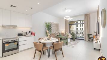 Luxury Apartment, Balcony, Pool View | In-room dining