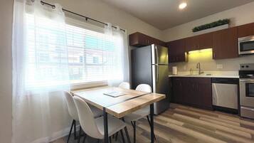 Coffee/tea maker, fridge, microwave, oven