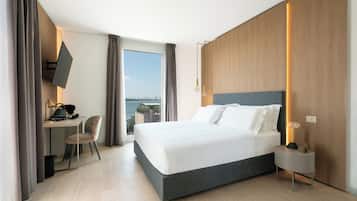 Chambre Premium, vue lagon | Literie de qualité supérieure, minibar, coffres-forts dans les chambres