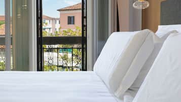 Ropa de cama de alta calidad y minibar