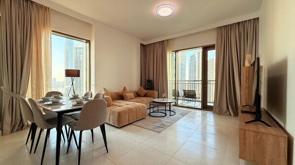 Standard Apartment, 2 Bedrooms | Living area | 32-inch flat-screen TV with satellite channels