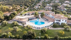 A large villa with a swimming pool, multiple bedrooms, and a landscaped garden. - Nicolaus Prime Villas   (Castiadas)