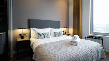 Laptop workspace, iron/ironing board, free WiFi, bed sheets