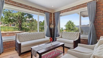 Habitación Deluxe | Área de sala de estar