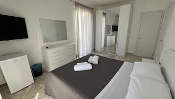 2 habitaciones, ropa de cama de alta calidad y minibar