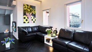 Apartment, 1 Bedroom, City View | Living room | Books - Exclusive Suite in the Heart of Bologna (Bologna)