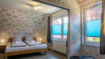 2 bedrooms, desk, iron/ironing board, travel crib