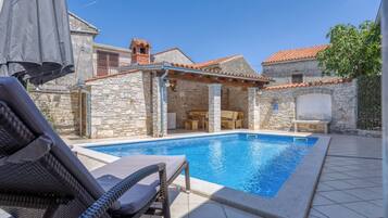 Seasonal outdoor pool, a heated pool