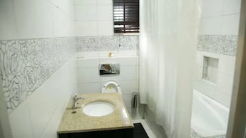 Apartment, 2 Bedrooms | Bathroom | Separate bathtub and shower, soap, toilet paper