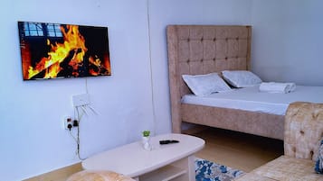 1 habitación, tabla de planchar con plancha, wifi gratis y ropa de cama
