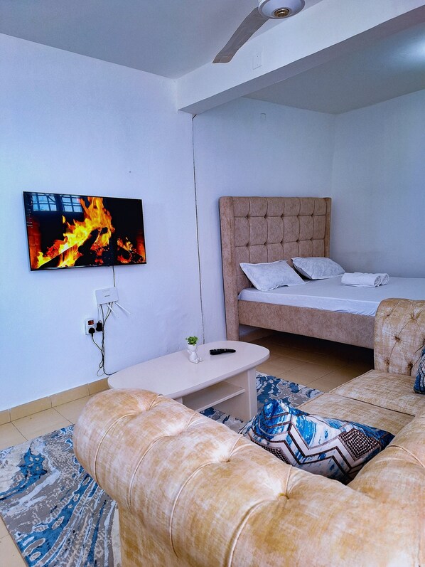 1 habitación, tabla de planchar con plancha, wifi gratis y ropa de cama 