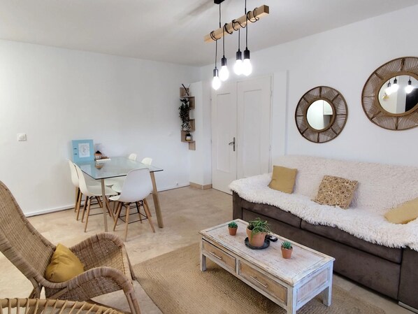 Economy Apartment, City View | Living area | TV
