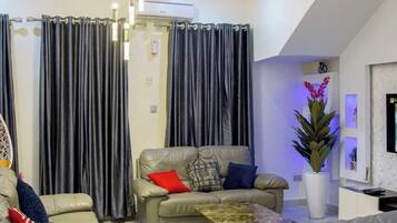 Family Apartment, Balcony, City View | Living area