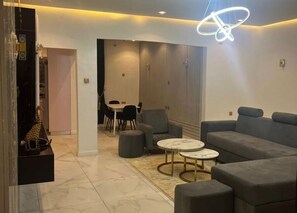 Family Apartment, Balcony, City View | Living area