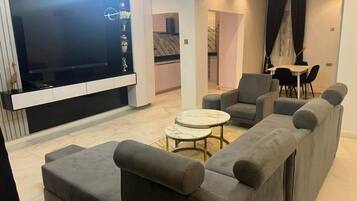 Family Apartment, Balcony, City View | Living area