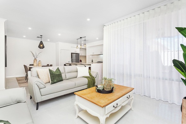 Living area connected to dining area and kitchen (Open Plan)