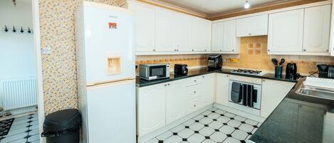 Fridge, microwave, oven, coffee/tea maker