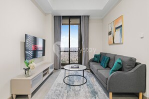 Apartamento, 2 quartos, vista para a cidade | Área de estar