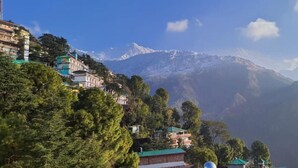 A mountainous landscape with buildings on a hillside. - goSTOPS Mcleodganj, Mall Road (McLeod Ganj)