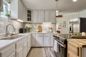 Fridge, microwave, dishwasher, coffee/tea maker