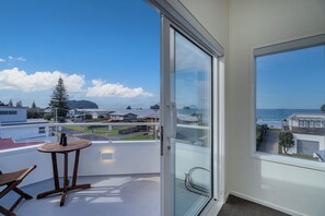 Enjoy the ocean view from this balcony with a clear view of the surrounding area.