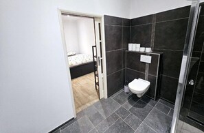 Shower, bidet, towels, soap