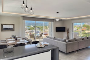 Comfort-Apartment | Wohnbereich | Flachbildfernseher