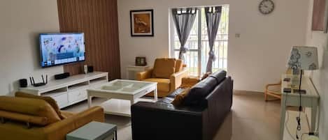 Appartement Confort, balcon | Aire de séjour