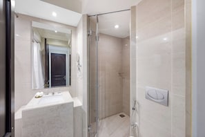A modern bathroom with a glass-enclosed shower, a sink with a mirror, and a towel rack. - Durrani Homes - Heaven on Earth collection 5BR with panorama Burj Khalifa and fountain views (Dubai)