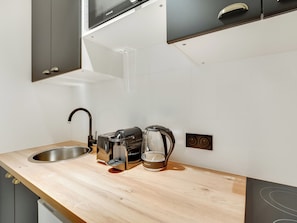 Fridge, microwave, coffee/tea maker, toaster