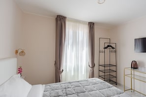 1 chambre, fer et planche Ă repasser, Wi-Fi gratuit, draps fournis