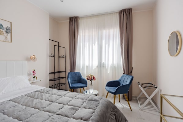 1 habitación, tabla de planchar con plancha, wifi gratis y ropa de cama 