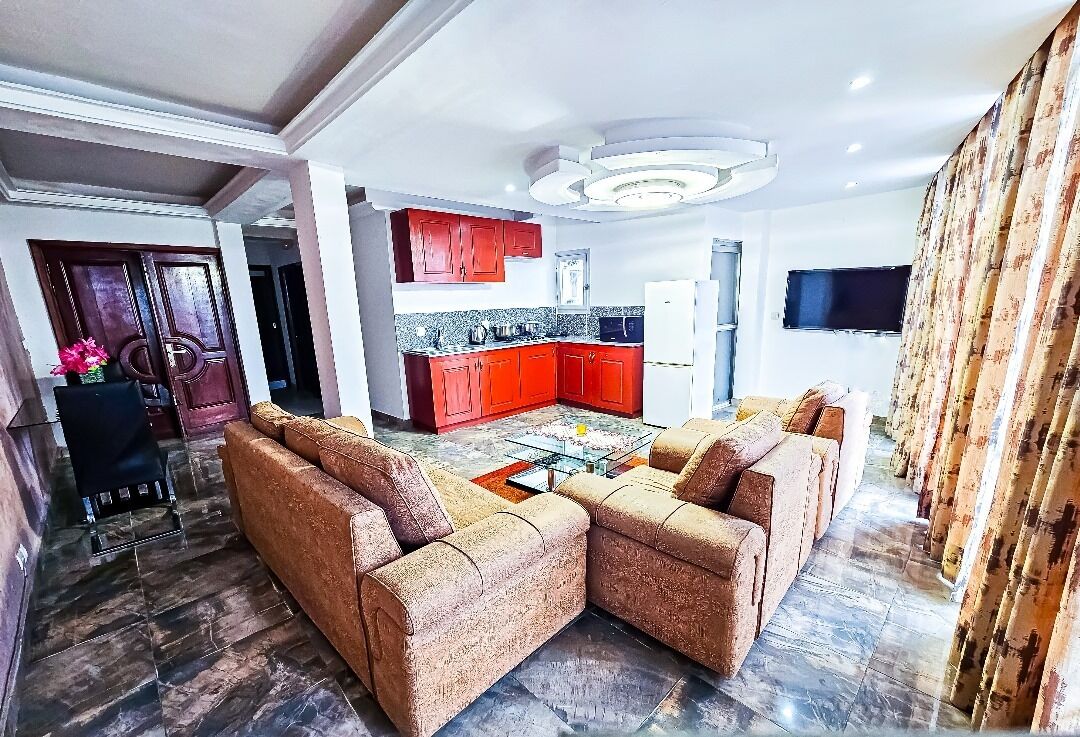 Apartamento Confort, balcón | Zona de estar | Una televisión