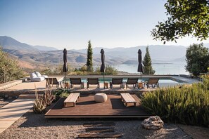 Outdoor pool, pool umbrellas, sun loungers