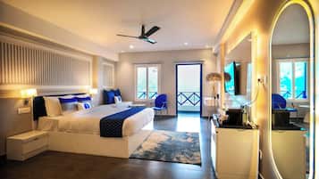 Quarto executivo, vista para o lago | Frigobar, cofres nos quartos, ferros/tábuas de passar roupa