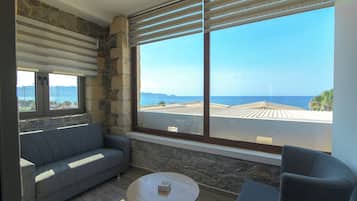 Suite junior, vistas al mar | Terraza o patio