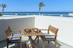 Suite panoramique, vue sur la mer | Terrasse/patio
