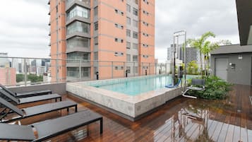 Outdoor pool, pool umbrellas, sun loungers