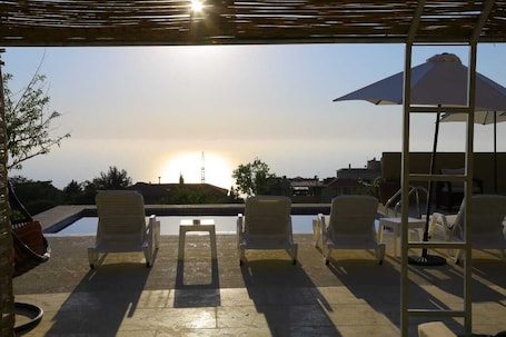 Seasonal outdoor pool, pool umbrellas, sun loungers. Chill Inn by Hansa