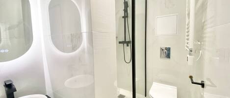 Hair dryer, towels, soap, shampoo