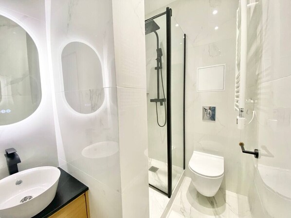 Hair dryer, towels, soap, shampoo