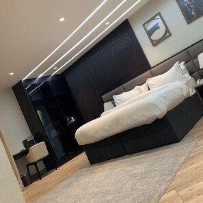 Family Room, Balcony, City View | Desk, laptop workspace, blackout drapes, soundproofing